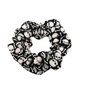 Handmade hair tie scrunchie.  Black with skulls.  Halloween